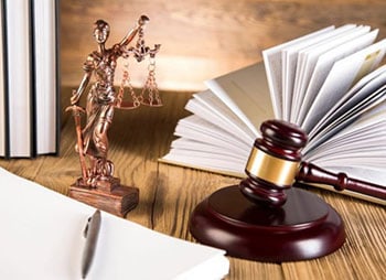 Image representing Mediator's office featuring a gavel and legal books - Aminu Law Firm, PLLC