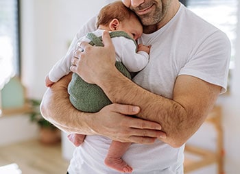 Image symbolizing paternity leave and family law rights - Aminu Law Firm, PLLC